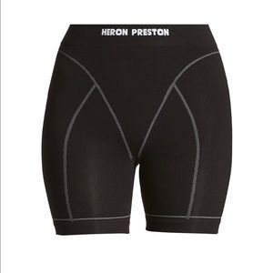 Heron Preston active logo biker shorts with top.
